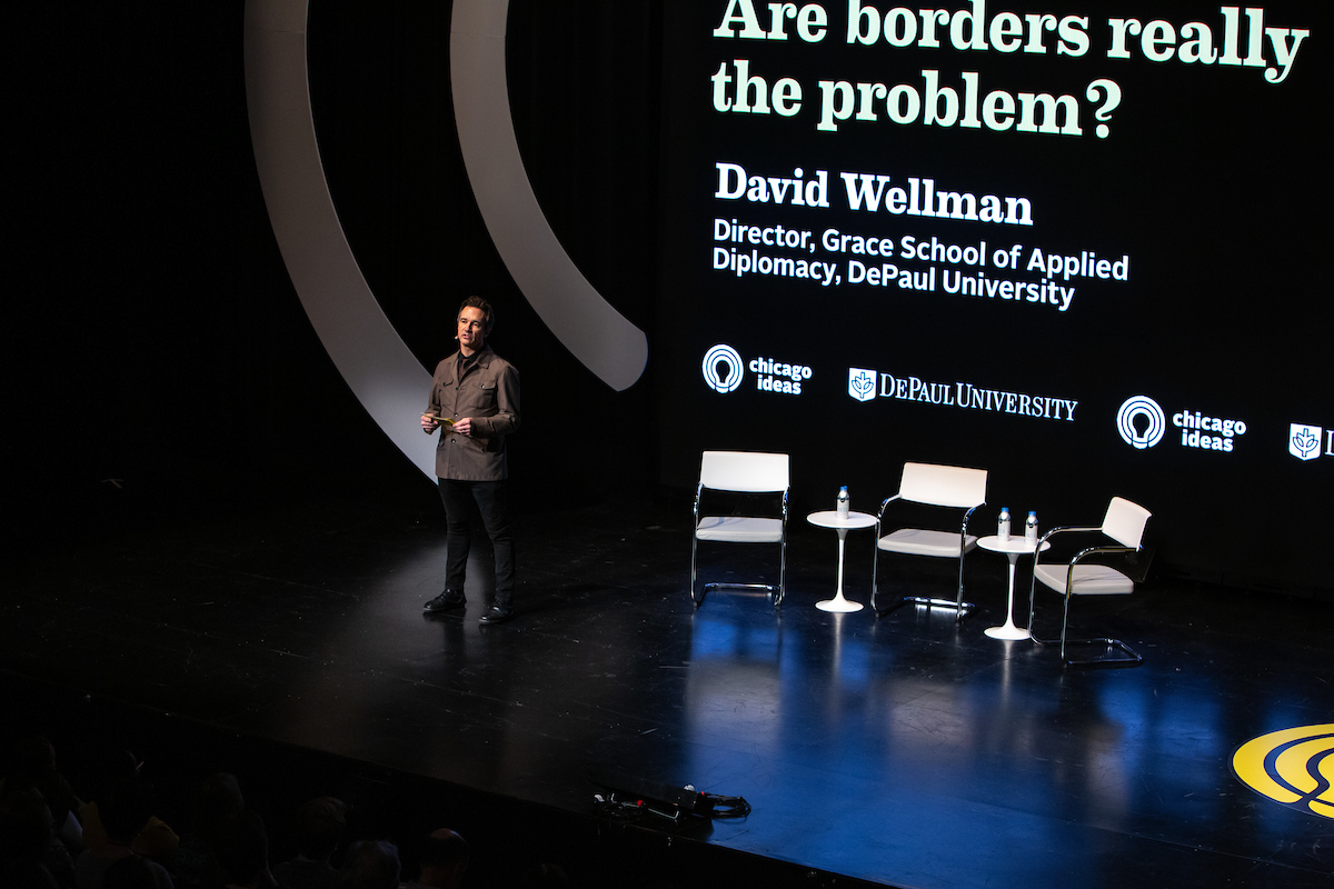 David Wellman, associate professor of Religious Studies, Peace, Justice and Conflict Studies and director of DePaul’s School of Applied Diplomacy, introduces panelists during the Chicago Ideas Week 